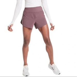 Athleta Run With It Shorts in Volcano purple. Size small.